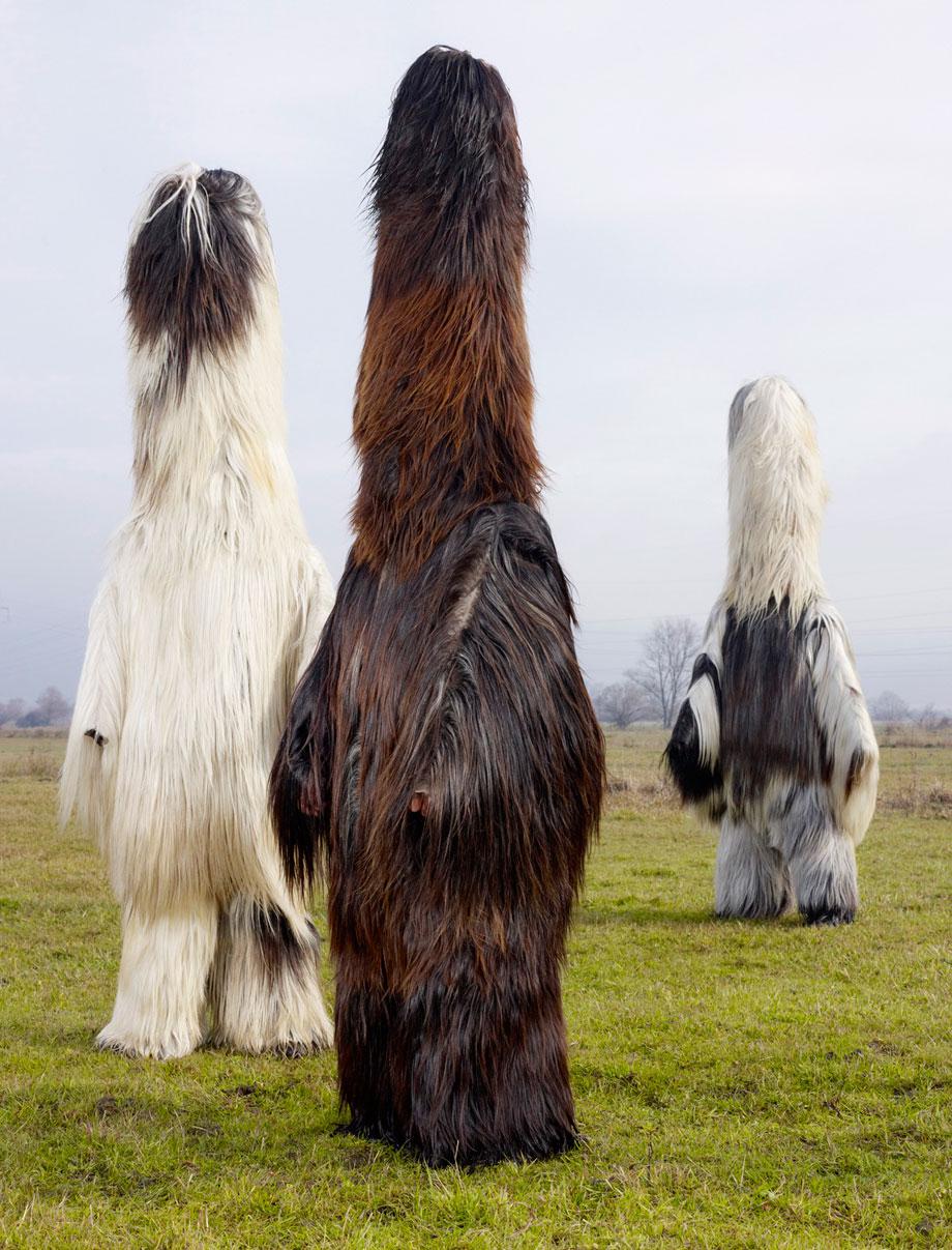 Photo of crazy long-necked yeti-like costumes