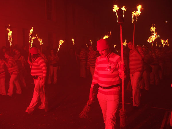photo of villagers with torches