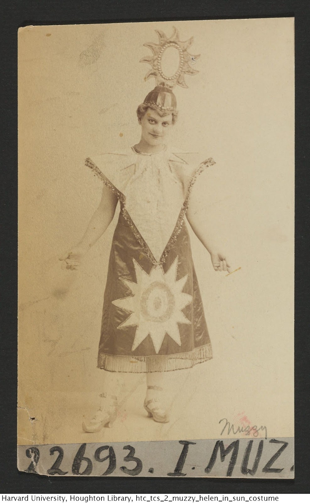 Historical photo of actress Helen Muzzy in wizardly "sun" costume